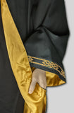Hooded robe close up of satin lining and trim on wide sleeve.