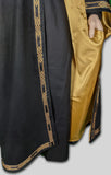Bottom of robe showing satin lining and trim around opening and hem.