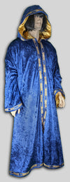Robe with hood made from panne velvet blue, lined in gold satin, trim around opening, bottom and sleeves. Custom-made in the USA.