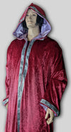 Robe made in burgundy velvet panne lined in lavender satin. Celtic Trim 201 around sleeves, opening, hood and bottom.  Made in USA