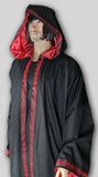 Robe with hood showing satin lining and trim.
